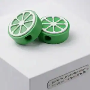 Perle cordon sweat citron vert imprimée en 3D, motif rondelle bicolore vert et blanc, fabrication Aela Creations France